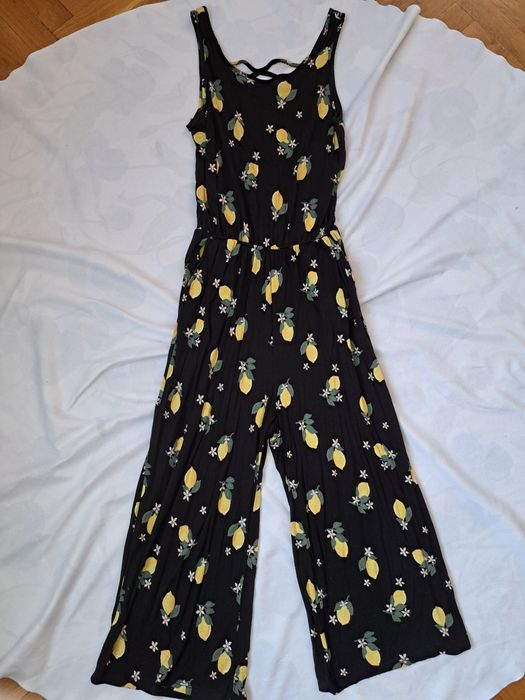 Черен платнен гащеризон на лимони