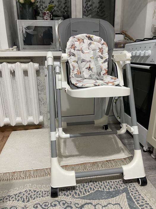 Стол для кормления-качеля.