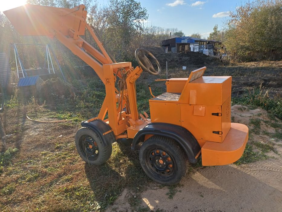 Мини трактор погрузчик