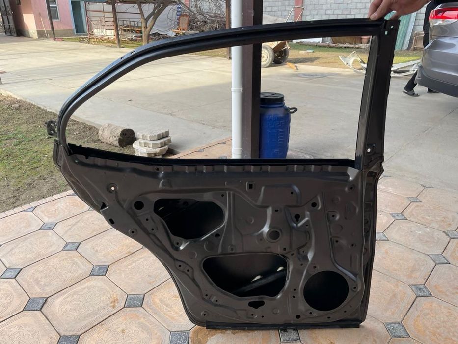 Дверь от камри 75