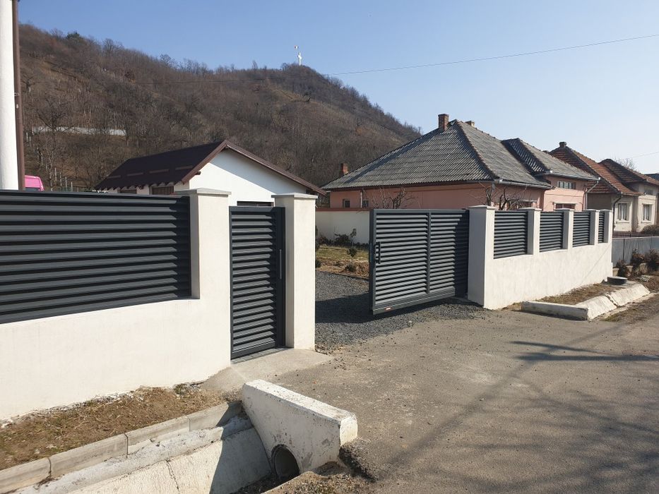 Construim garduri si porti din sipca metalica, panouri stil jaluzele,