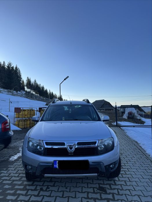 Dacia Duster 1.6 benzină,105 cp,4x4 la buton