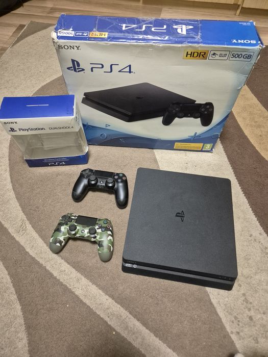 Playstation 4 slim de un 1 TB, +2 controlare