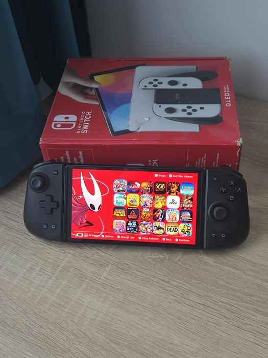 Nintendo Switch OLED Modat 512 gb + 74 Jocuri + Mobapad M6 HD – Stare excelentă