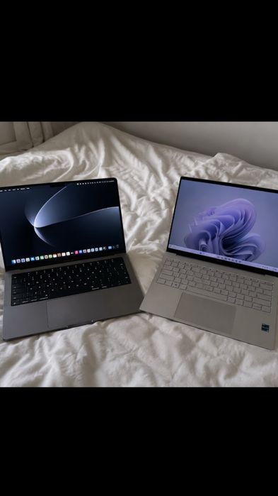 Leptop dreapta     Dell XPS 15 sau un Dell XPS 16. Leptop st