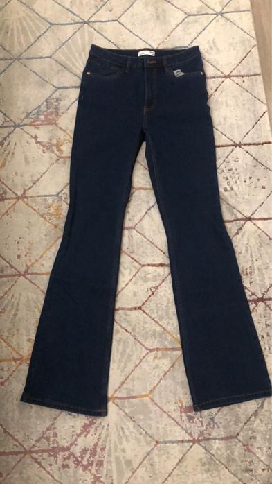 джинсы клеш , новые