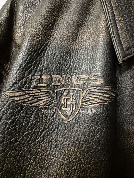 Geacă din piele naturală marca UNCS, model bomber, mărime mare, grea