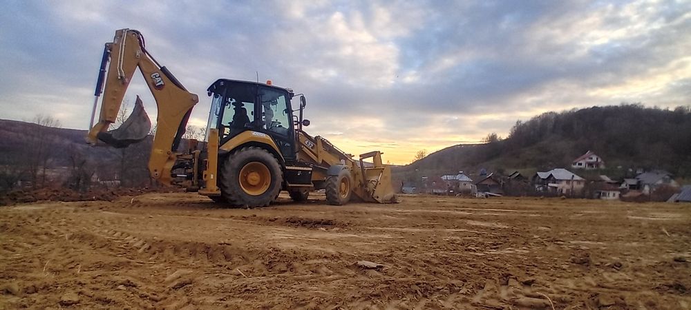 Buldoexcavator caterpillar