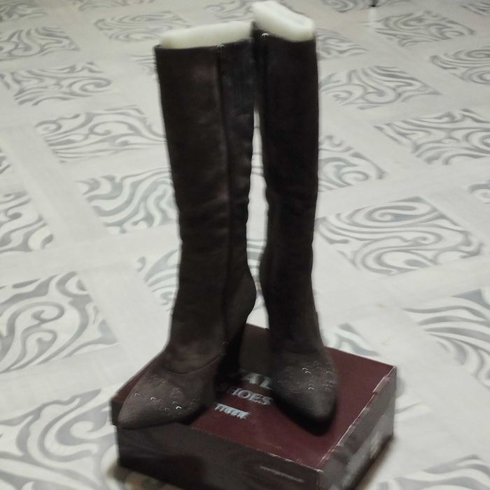 Продам сапоги новые