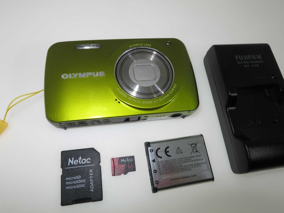 Olympus VH 210 ултра компактен фотоапарат в страхотен свеж зелен цвят и състояние като НОВО, тестван и работи отлично, пълен комплект
