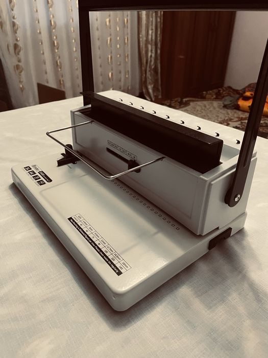 Переплетная машина на металлическую пружину