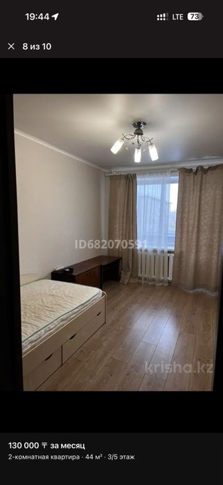 Кровать с выкатными ящиками для белья