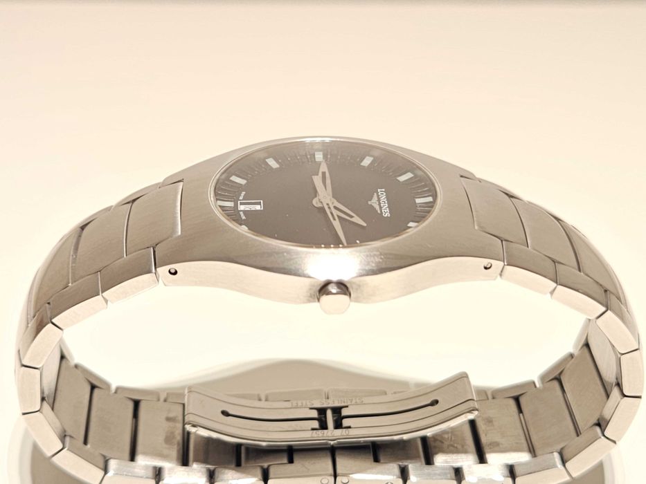 Продаван елегантен стомана кварц мъжки  дамски часовник"Longines"