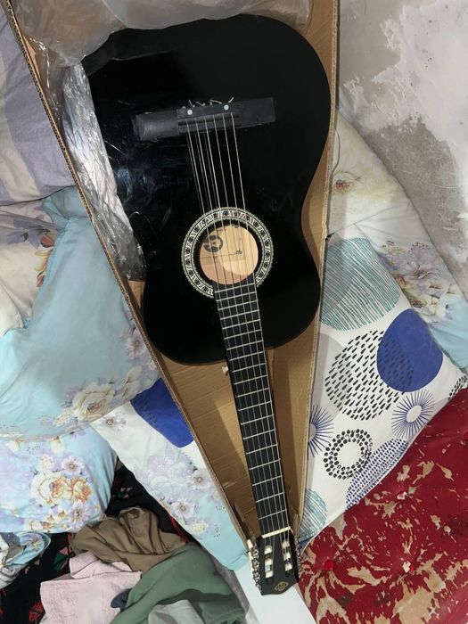 Гитара новая... .