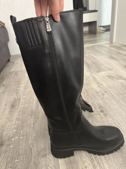 Продам новые сапоги