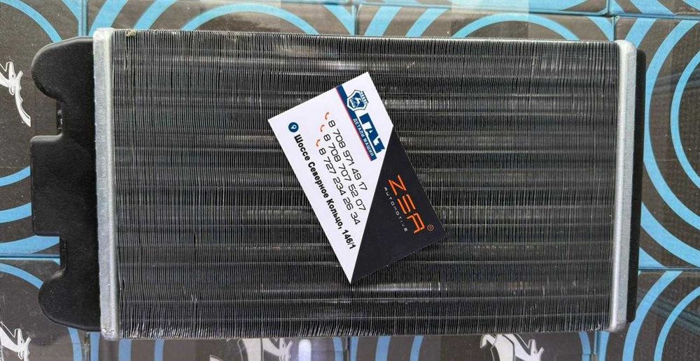 Радиатор отопителя  Next