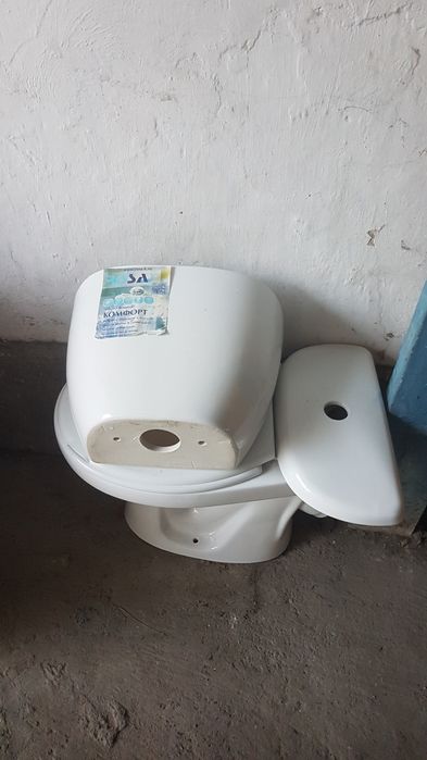 Продаю унитаз бу с бочком