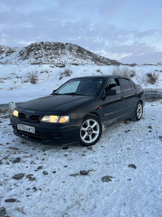 Ниссан примера п11