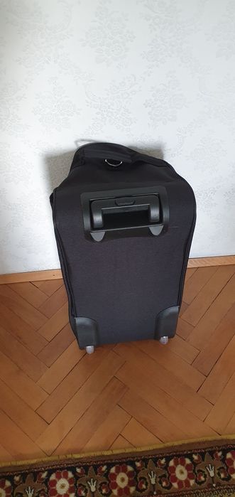 Чанта за пътуване на колела и с дръжка