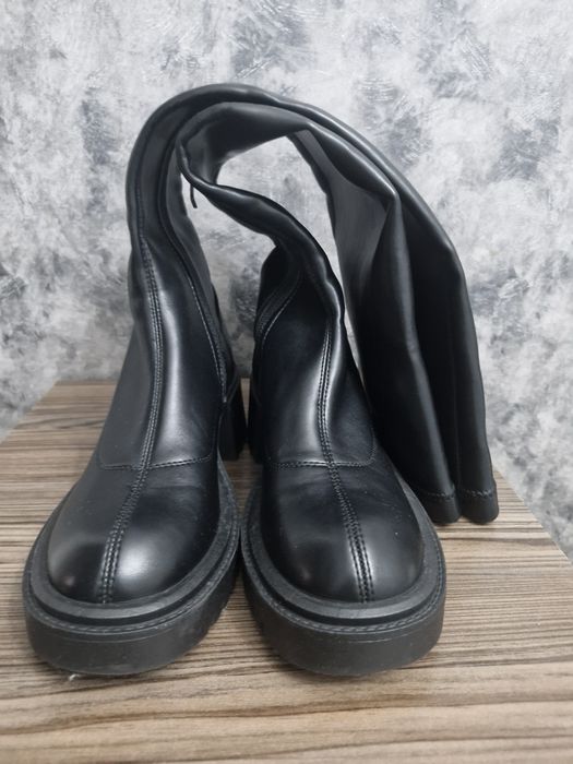 Женские сапоги ботфорты.