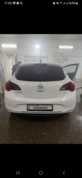 Опель астра j 2013 года