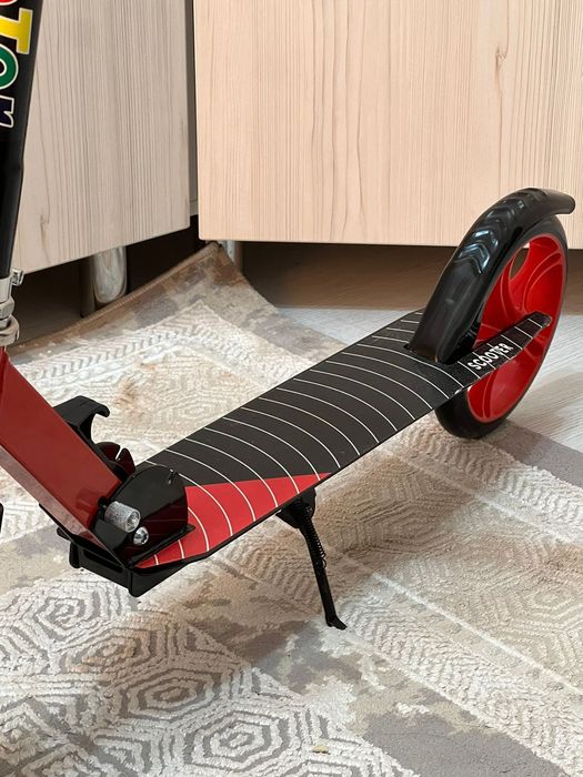 Новый самокат не использованный