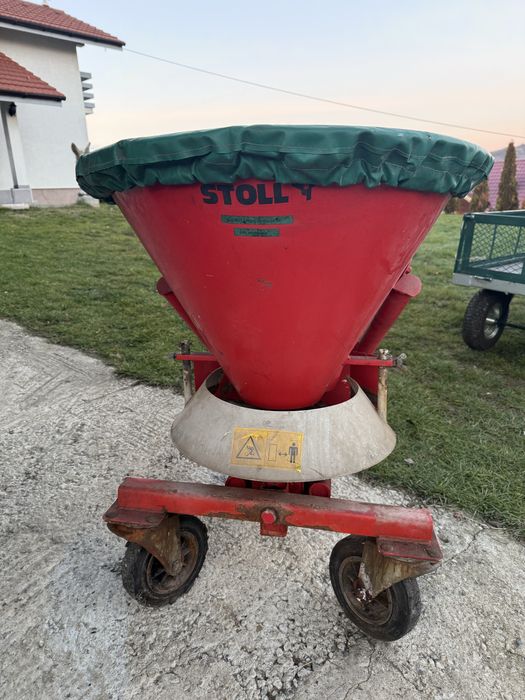 Sararita motocultor Stoll . Dispozitiv de imprastiat