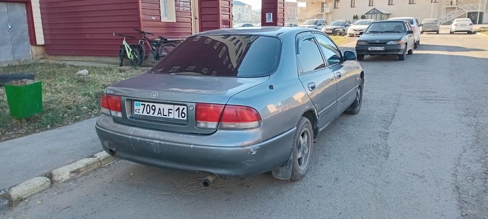 Мазда кронус 92..