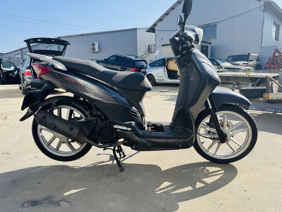 Sym Symphony 125  DEFECT fara acte LIVRARE se vinde doar intreg