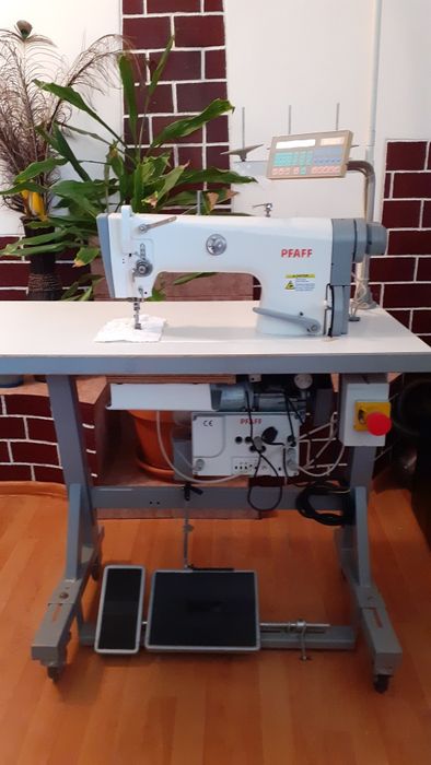 Masini de cusut  full automate ,cu taiere de fir