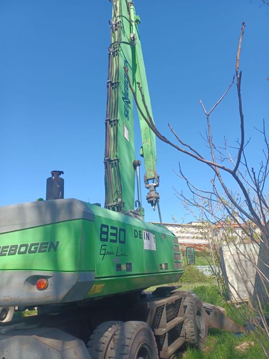 Excavator pe Roti Senneboghen 830 2010 pentru Manipulare Marfa 15m Reviziile La Reprezentanta
