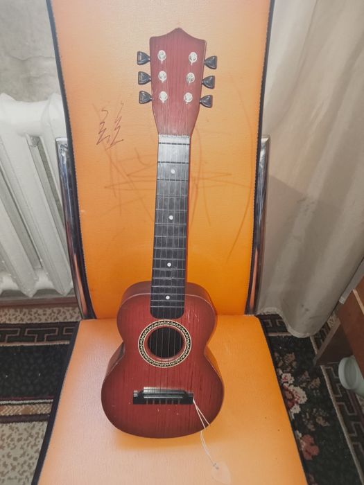 Гитара детская , не ролзованая.