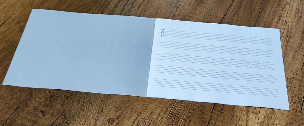 Нотная тетрадь для музыкальной мелодии