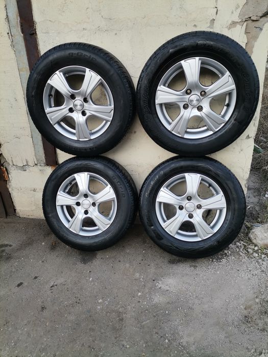 Легкосплавные диски R14 с шинами.