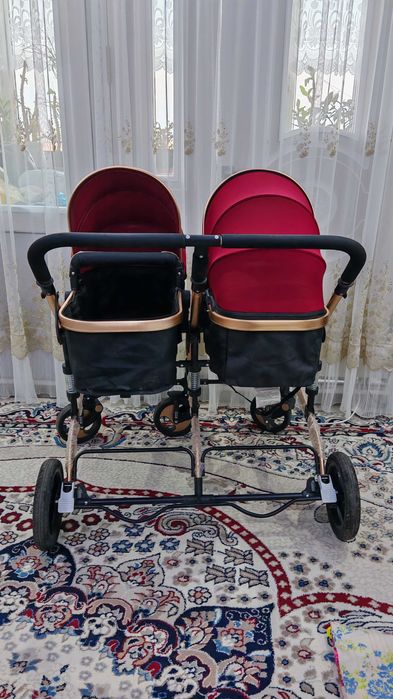 Продам двойную коляску для близнецов