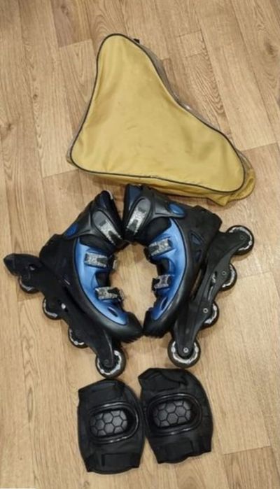 Роликовые коньки