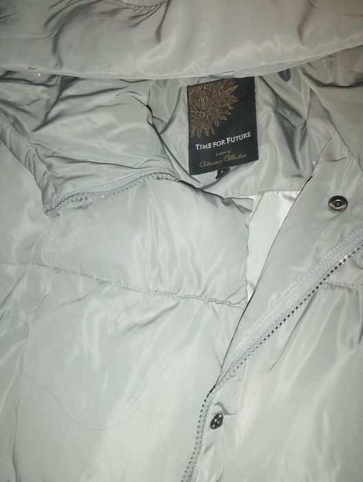 Продам пуховик женский