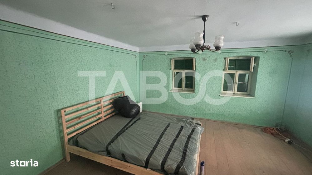 Casa si teren 1800 mpu cu utilitati si posibilitate de extindere