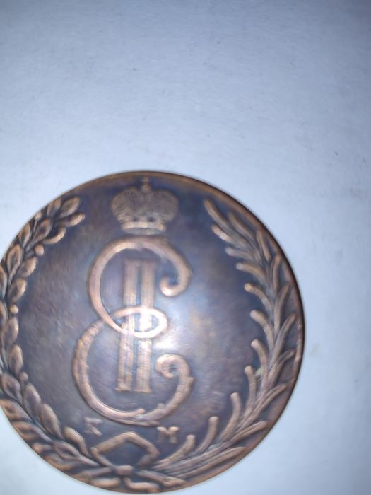 Каска пожарника монета