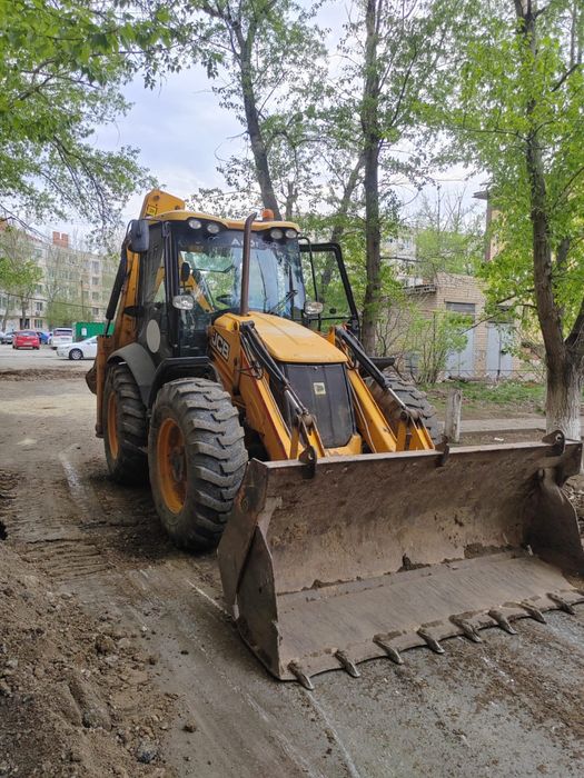 Услуги экскаватора погрузчика