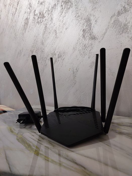 Mercusys икки диапазонный узоқдан хам зур ишлиди холати янгидай