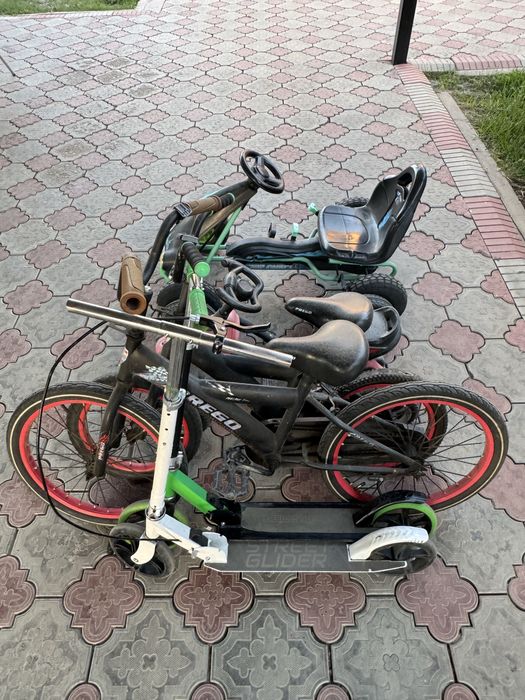 2 Велосипеда,2 машины,2 самаката.