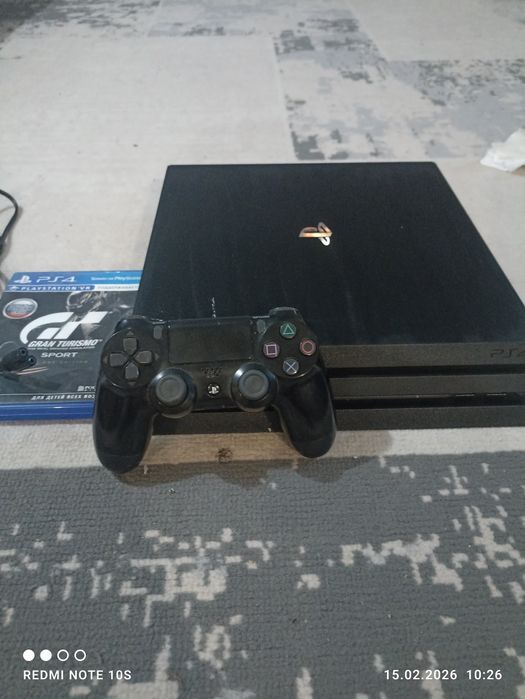 Продам приставкуPS 4 PRO с диском и джостиком