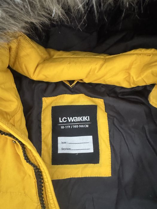 Пуховик на мальчика р. 140-146