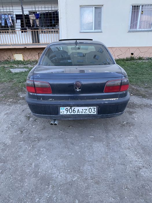 опель омега