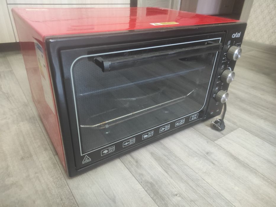 Продам духовку Artel