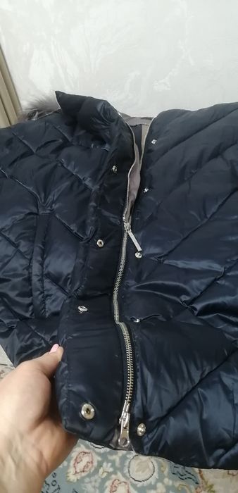 Пуховик стильный