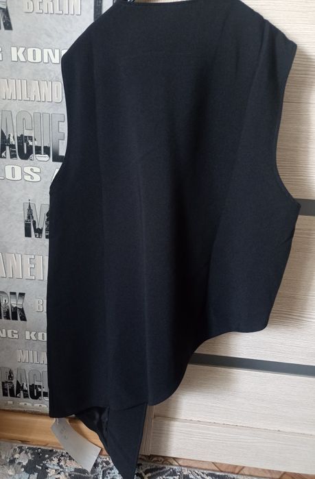 Продам жилет новый.