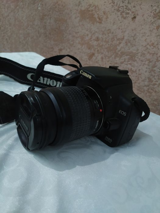 Foto aparat qoʻshimcha Binokili bilan