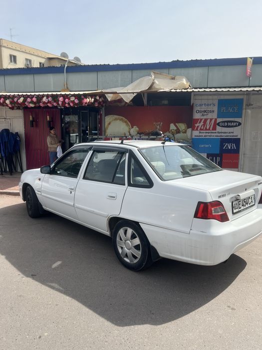 Нексия 2, белый цвет